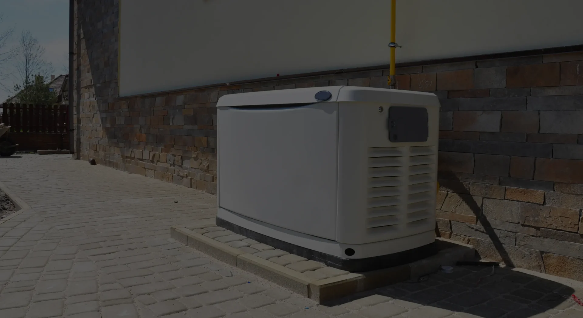 Standby generator installed beside house